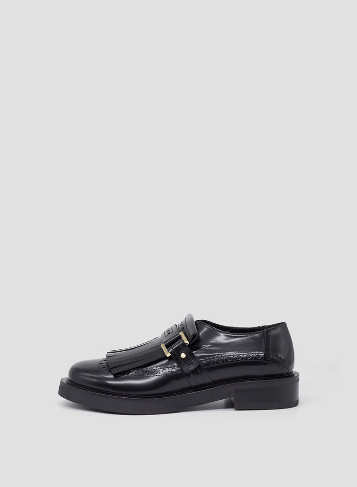 MOCASSINO IN PELLE CON FRANGE
