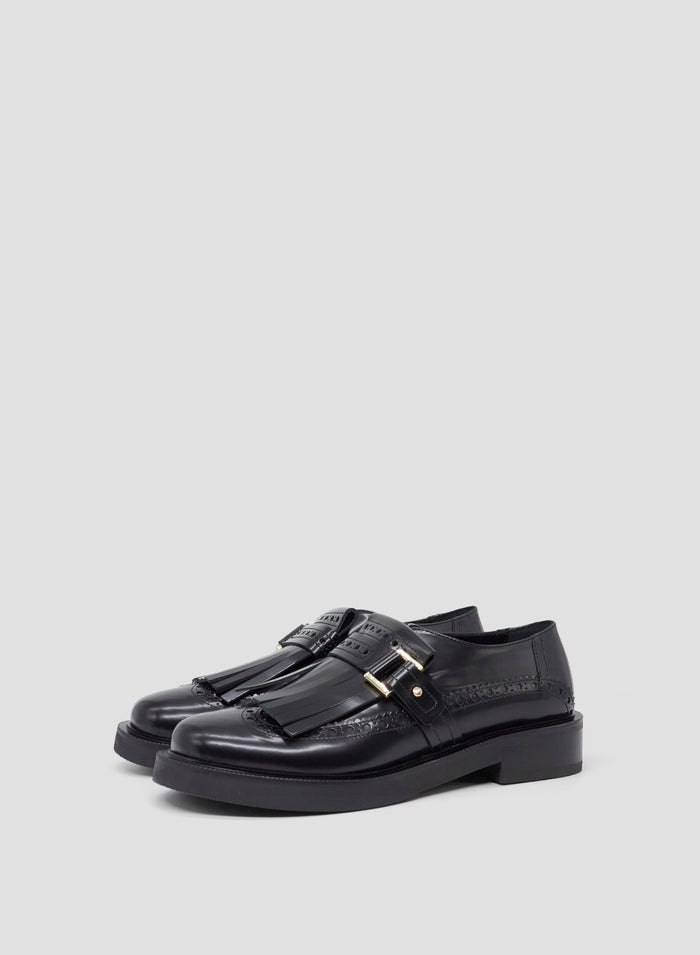 MOCASSINO IN PELLE CON FRANGE