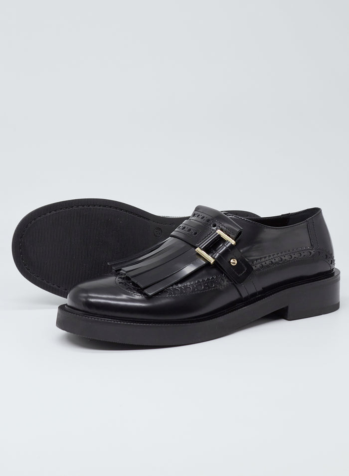 MOCASSINO IN PELLE CON FRANGE