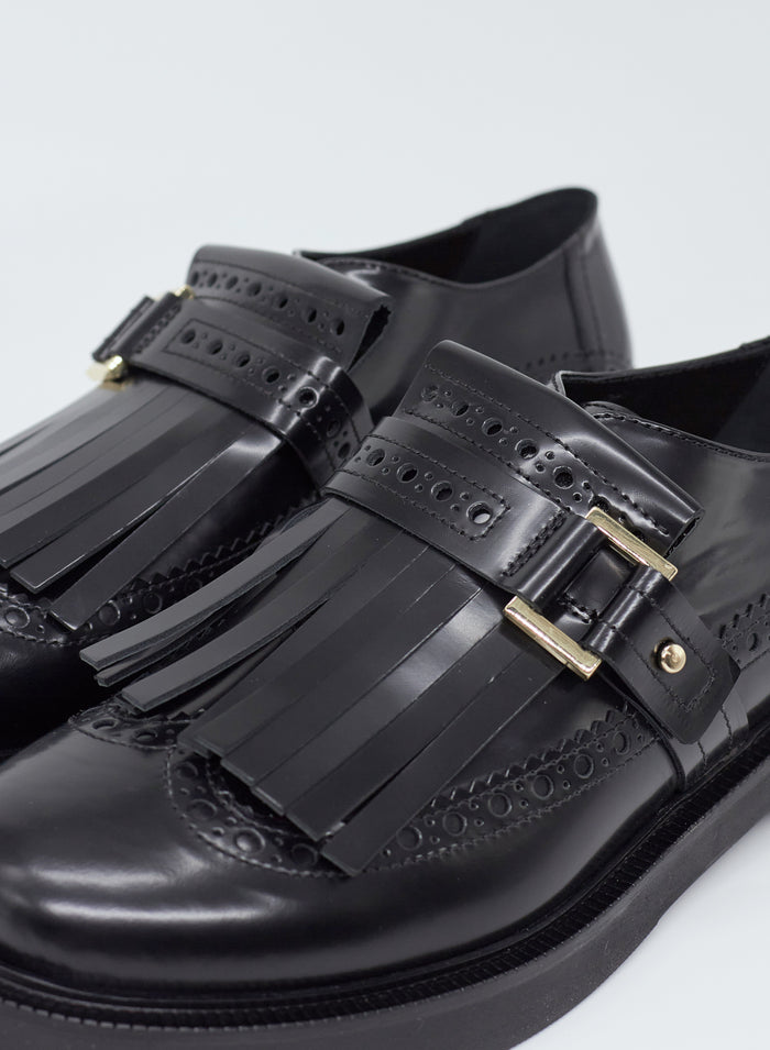 MOCASSINO IN PELLE CON FRANGE