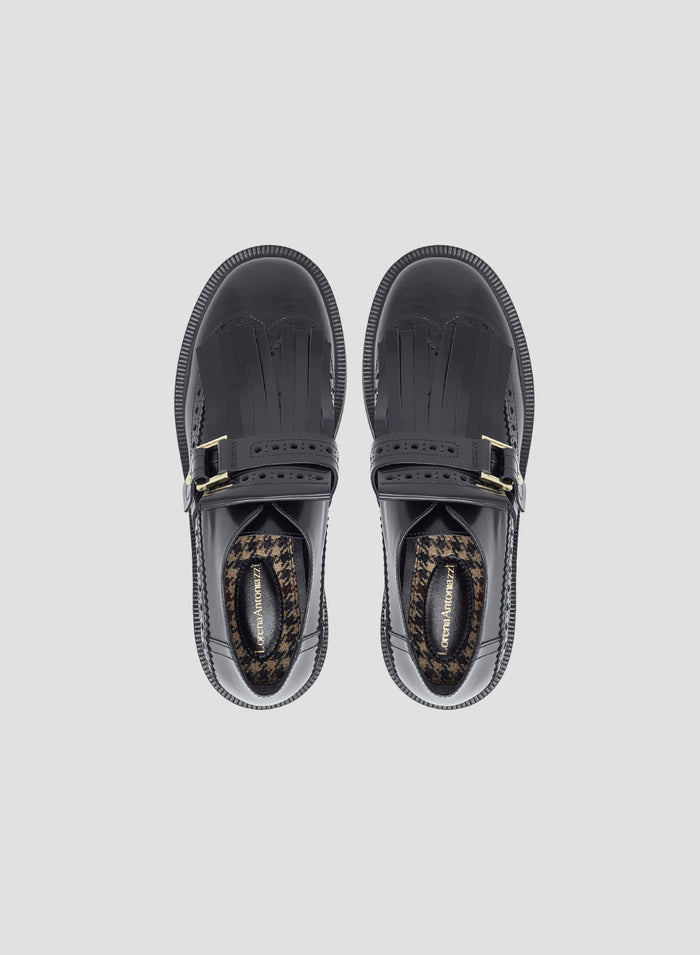 MOCASSINO IN PELLE CON FRANGE