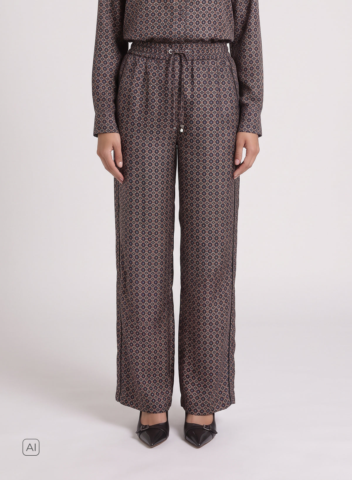 PANTALONI CON COULISSE IN SETA CON STAMPA CRAVATTA GEOMETRICA