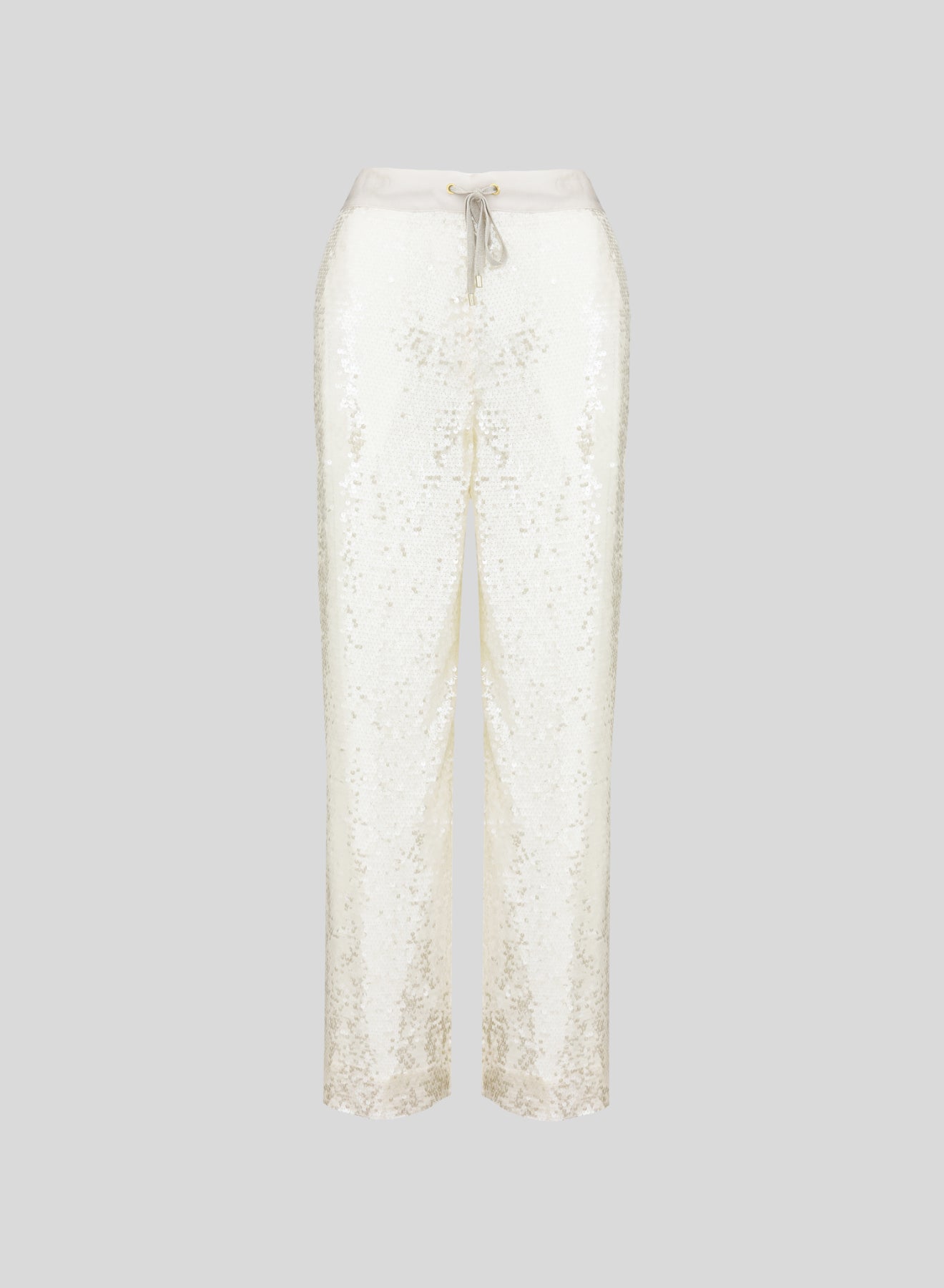 PANTALONI IN RETE E MICROPAILLETTES