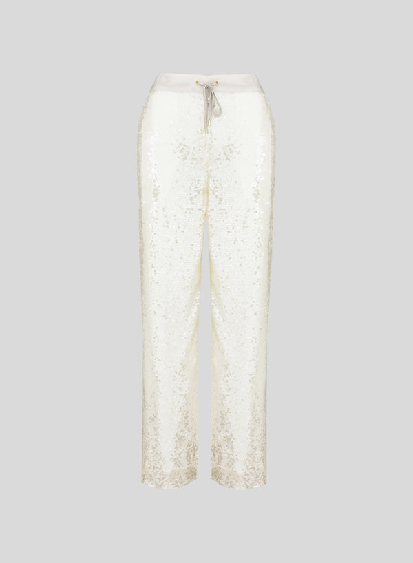 PANTALONI IN RETE E MICROPAILLETTES